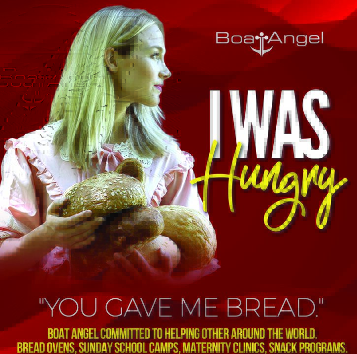 Image of blonde woman carrying loaves of bread and looking off into the distance.